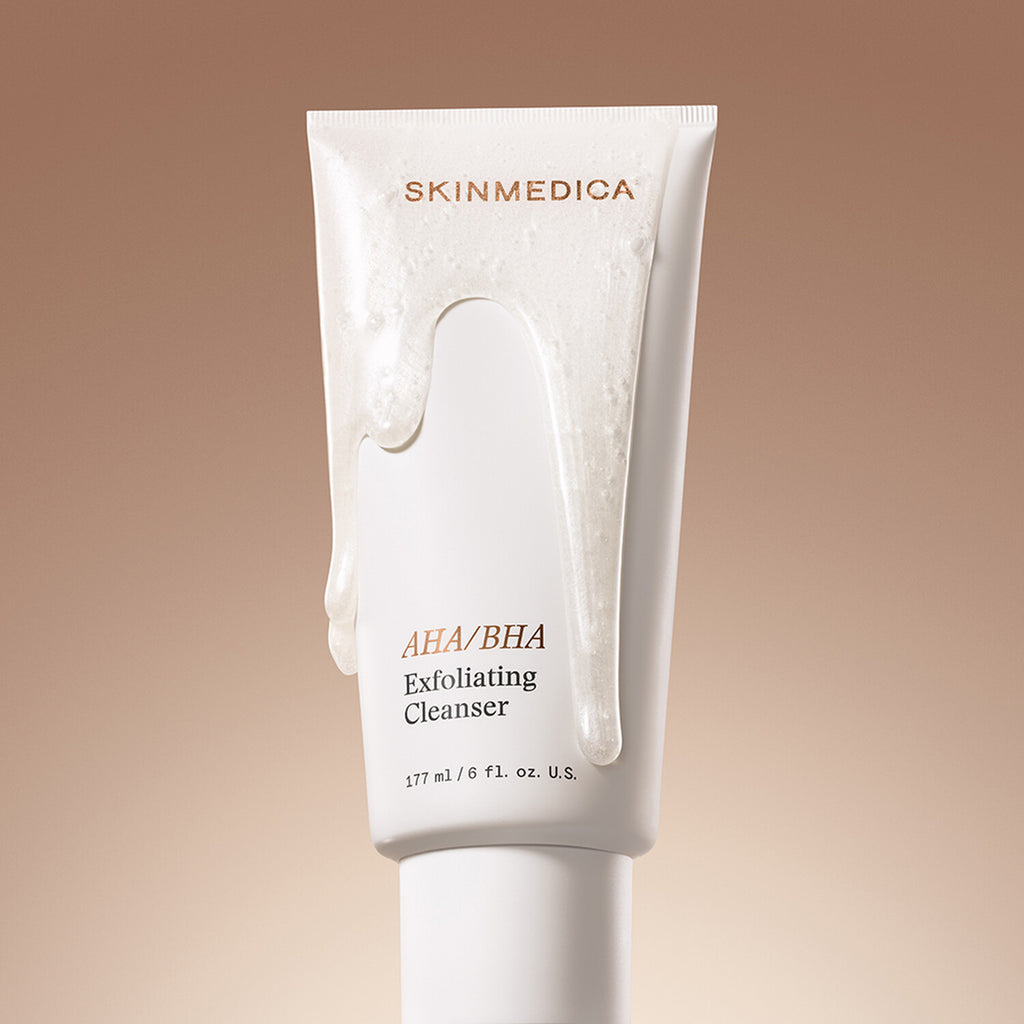 SkinMedica AHA/BHA Exfoliating Cleanser lifestyle shot showing the cleanser bottle in a styled setting