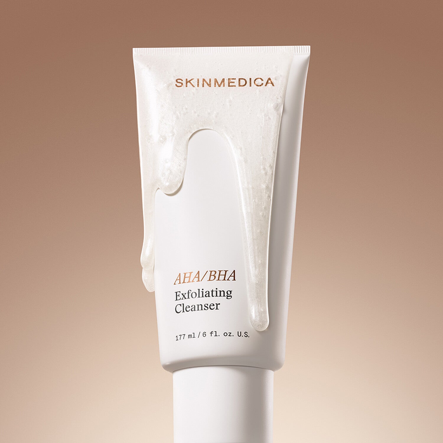 SkinMedica AHA/BHA Exfoliating Cleanser lifestyle shot showing the cleanser bottle in a styled setting